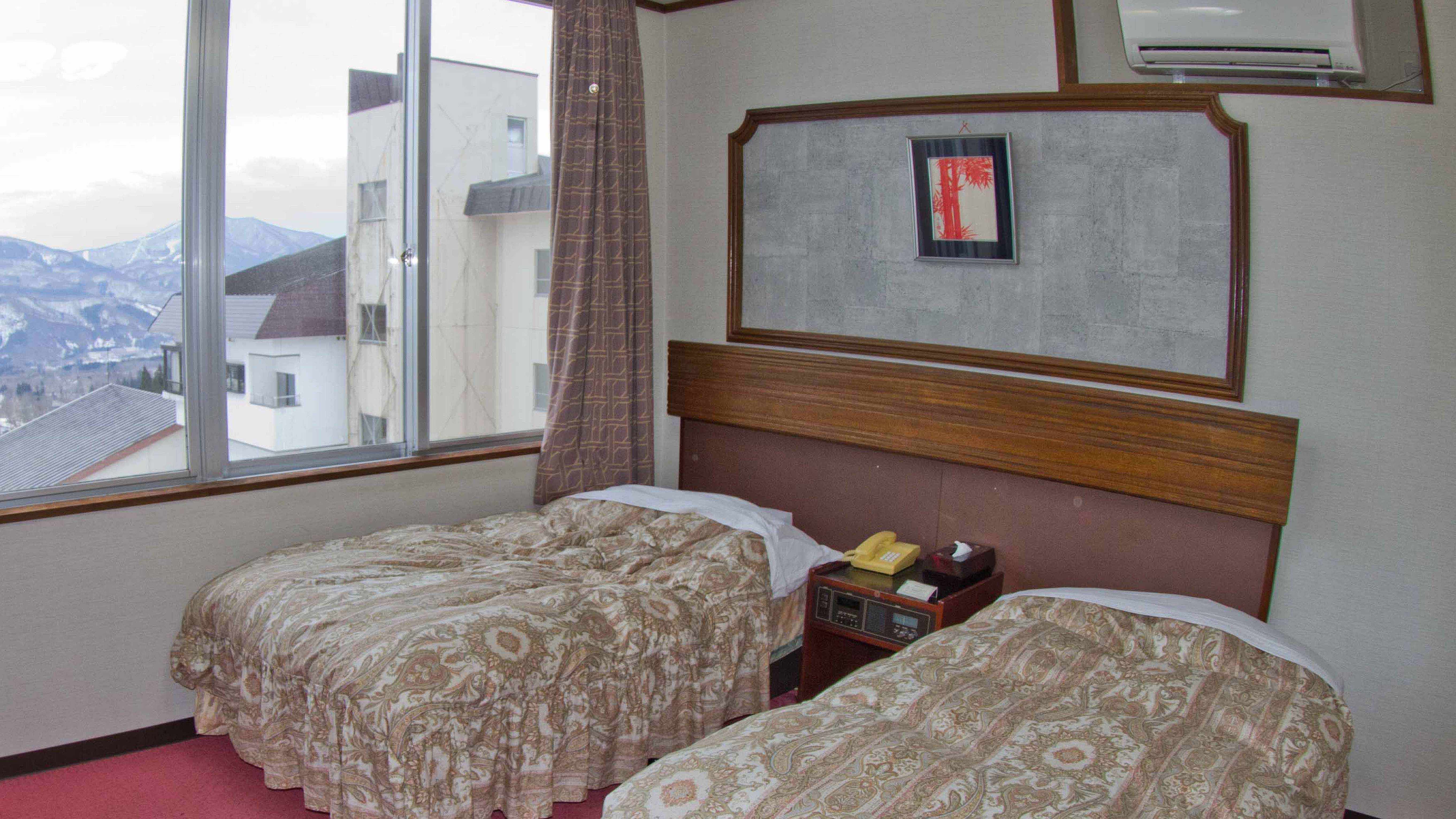 Myoko-Hotel-Taizan-Bedroom