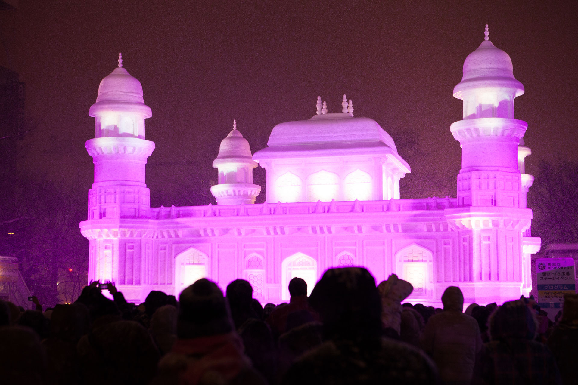 chinese-new-year-niseko-3 Gourmet grilled salmon dish with mushrooms and greens on white plate.